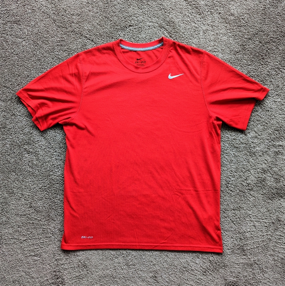 Three (3) Nike athletic tee shirts
